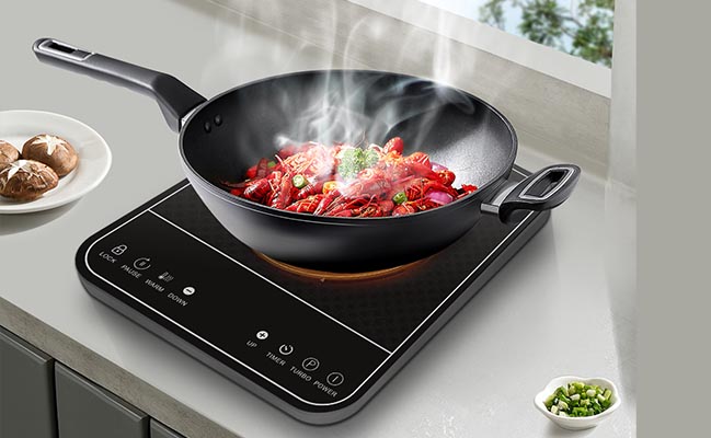 Quel est le principe de fonctionnement d'une cuisinière à induction ?
